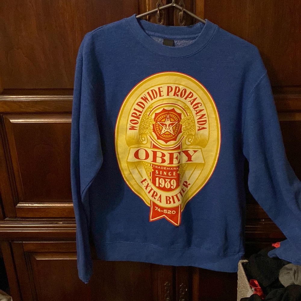 Mens Obey pull over. Size small blue.